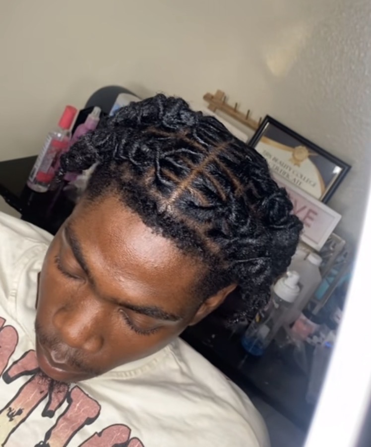 Locs styled after a retwist.